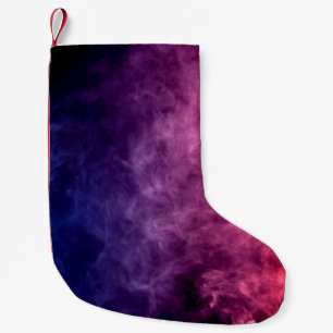 Petite Chaussette De Noël Nuages colorés de fumée violette et bleue sur le d