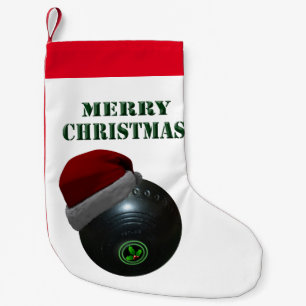 Petite Chaussette De Noël Pelouse Portant Un Chapeau De Père Noël,