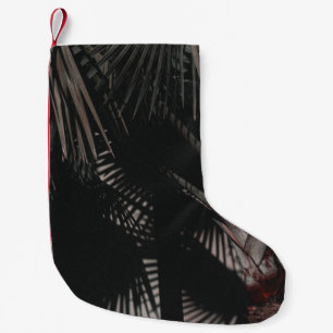 PETITE CHAUSSETTE DE NOËL PHOTOGRAPHIE DE PLUS PRÈS DU PALMIER VERT EN FED