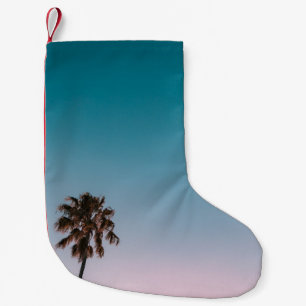 Petite Chaussette De Noël Photographie en angle bas de trois palmiers sous b