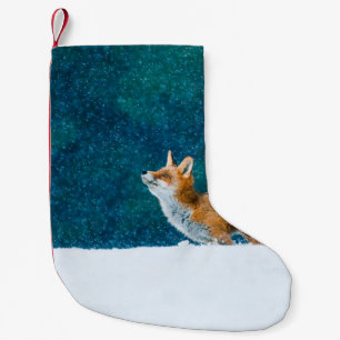 Petite Chaussette De Noël Renard en chute de neige. Renard rouge, Vulpes vul