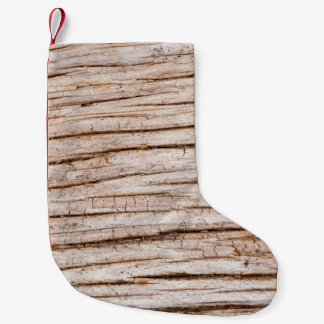 Petite Chaussette De Noël Texture en bois foncé. arrière - plan Abstrait Vin
