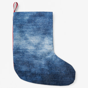 Petite Chaussette De Noël Tissu en denim usé, arrière - plan texturé.