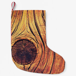 Petite Chaussette De Noël Vieille texture en bois comme arrière - plan. Vint