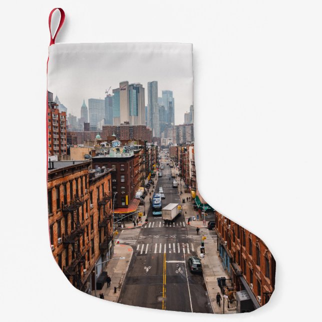 PETITE CHAUSSETTE DE NOËL VOITURES SUR LA ROUTE ENTRE LES BÂTIMENTS À HAUTE  (Devant)