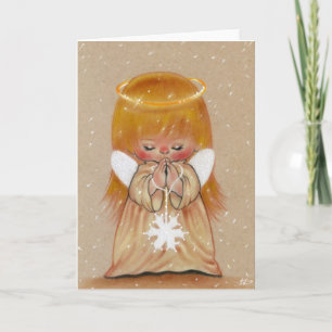 Peu d'ange d'hiver dans la carte de Noël de neige