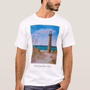 Peu de T-shirt de phare de point de sable