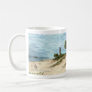 Peu de tasse de café du Michigan de phare de sable