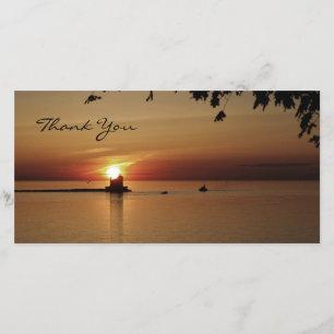 Phare de coucher du soleil de Merci