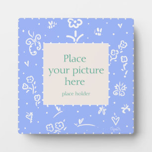 Photo Plaque à cadre de fleurs bleu et blanc