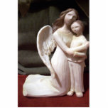 Photo Sculpture Ange et enfant<br><div class="desc">Cette image symbolise la protection, le confort, le pardon, l'amour, la douceur, la bonté, la gentillesse, la patience, la force, la confiance, la foi, etc.</div>
