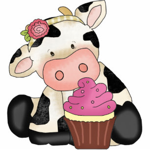 Photo Sculpture Sculpture en vache à petit gâteau