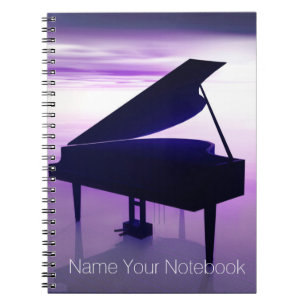 Piano à queue sur le carnet de musique de plage d