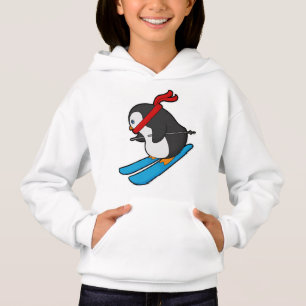 Pingouin comme skieur avec ski