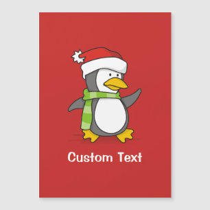 Pingouin de Noël marchant sur la neige