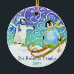 Pingouin Skiing Famille Ornement de Noël personnal<br><div class="desc">Ce personnage fantaisiste de Pingouins à Jouer est coloré à l'eau de la main par Audrey Jeanne Roberts et peut être personnalisé pour les bébés parfaits premier ornement de Noël, surtout pour un bébé d'hiver ou une famille de ski ou de snowboard! Idéal pour un bébé garçon ou une petite...</div>