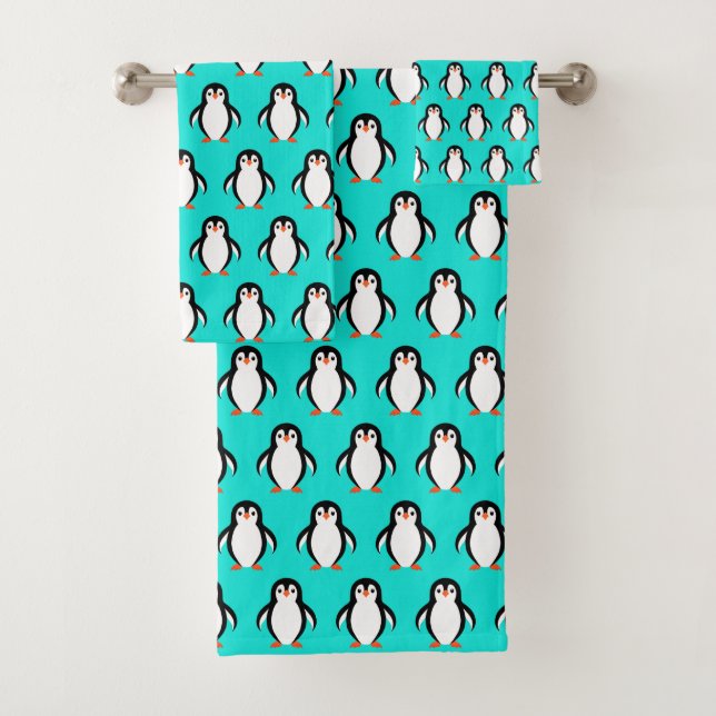 Pingouins adorables sur le bleu turquoise  (En situation)