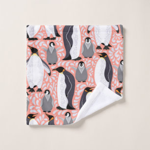 Pingouins empereurs et leurs petits sur un papier