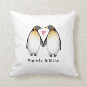 Pingouins personnalisés dans le coussin d'amour