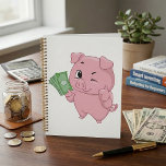 Pink Pig Holding Cash Giving Thumbs Up<br><div class="desc">Organize your path to prosperity with this rich pink pig spiral planner. The cover features a winking cartoon mascot holding money and giving a thumbs up, providing daily motivation as you track your appointments and financial goals. This high quality planner is perfect for students, business professionals, or anyone managing a...</div>