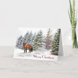 Pins enneigés avec carte de vœux de Noël au renard