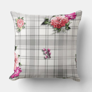 Pivoines roses vintage sur un oreiller floral à ca