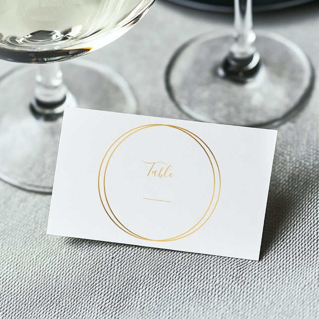 Placement Carte de numéro de table Elegant Gold Rings (Gold rings around elegant text for a wedding reception table number.)