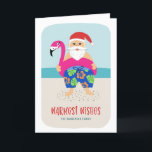Plage Tropicale de Père Noël Pool Flottant Vacance<br><div class="desc">Cette adorable carte de vacances présente une Père Noël tropicale dessinée à la main, portant des maillots de bain colorés et un flotteur fuchsia flamingo ! L'arrière - plan comprend la plage de sable, l'océan et le ciel. Facile à customiser avec votre propre texte à l'avant et à l'intérieur de...</div>