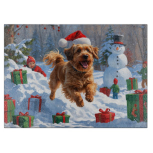 Planche À Découper Bichon Havanais courant dans la neige avec un chap