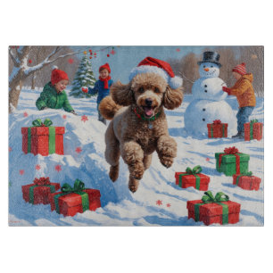 Planche À Découper Caniche courant dans la neige avec un chapeau de N