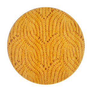 Planche À Découper Chandail en tricot orange, arrière - plan texturé.