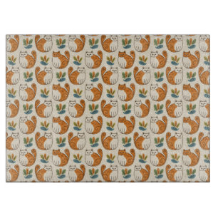 Planche À Découper Chats orange et blanc dans un style d'art naïf