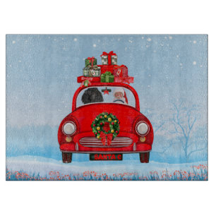 Planche À Découper Chien caniche dans une voiture avec le Père Noël