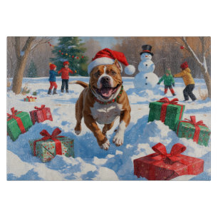 Planche À Découper Chien Pitbull courant dans la neige avec un chapea