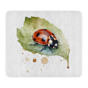 Planche À Découper Coccinelle chanceuse sur une feuille