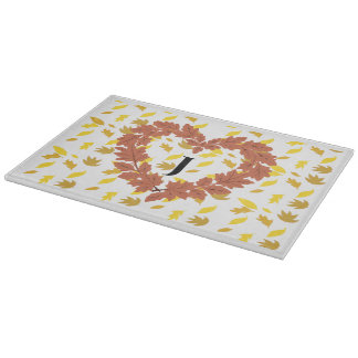 Planche À Découper Couronne d'automne sur son lit de feuilles