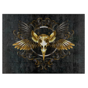 Planche À Découper Crâne d'oiseau doré sur fond noir