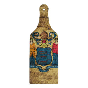 Planche À Découper Drapeau d'état de New Jersey sur le vieux grain e