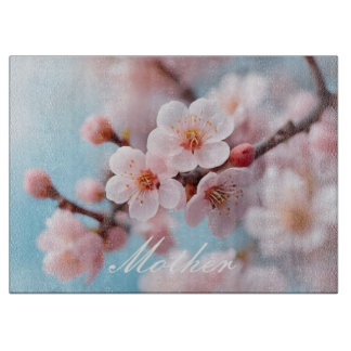 Planche à découper en fleurs roses