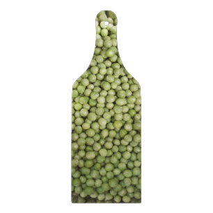 Planche à découper en verre avec bol de pois