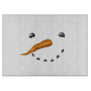 PLANCHE À DÉCOUPER FACE À LA NEIGE