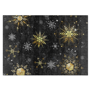 Planche À Découper Flocons de neige dorés de Noël sur fond noir
