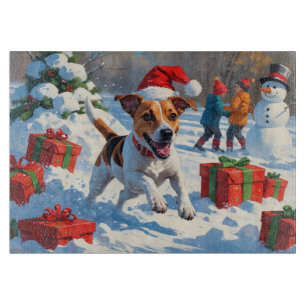 Planche À Découper Jack Russell courant dans la neige avec un chapeau