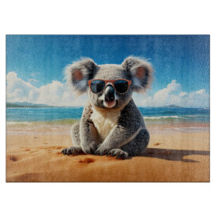 Planche À Découper Koala sur une plage de sable