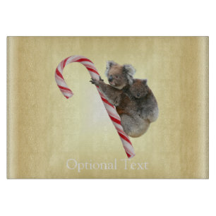 Planche À Découper Koalas de Noël sur un bâton de bonbon