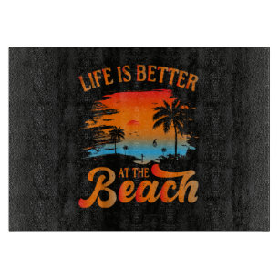 Planche À Découper La vie est meilleure à la plage