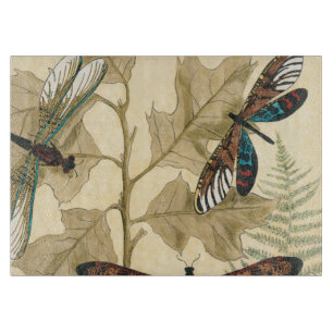 Planche À Découper Libellules colorées flottant au-dessus du feuille
