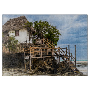 Planche À Découper Maison pittoresque sur un affleurement de corail t