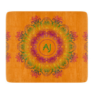 Planche À Découper Mandala Monogram.arrière - plan orange.