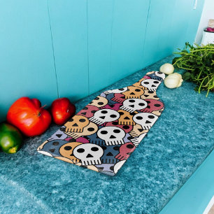 Planche À Découper Motif de crânes multicolores
